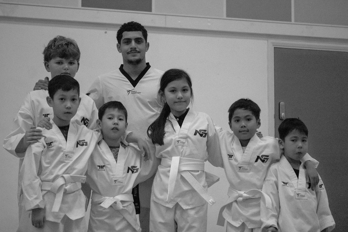 Taekwondo students training together as a team in Putney, South West London
